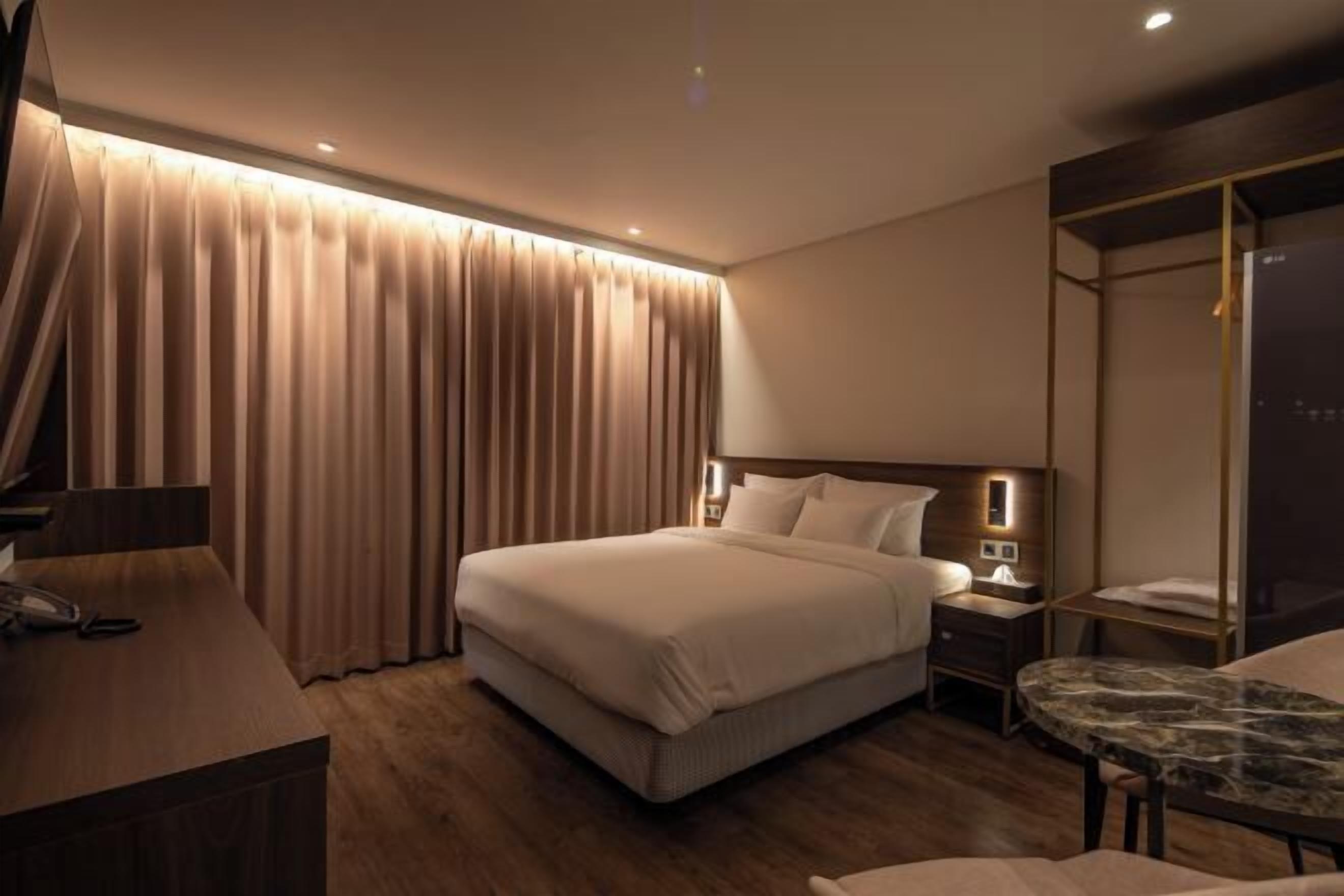 Down duvets, Select Comfort beds, blackout curtains, free WiFi