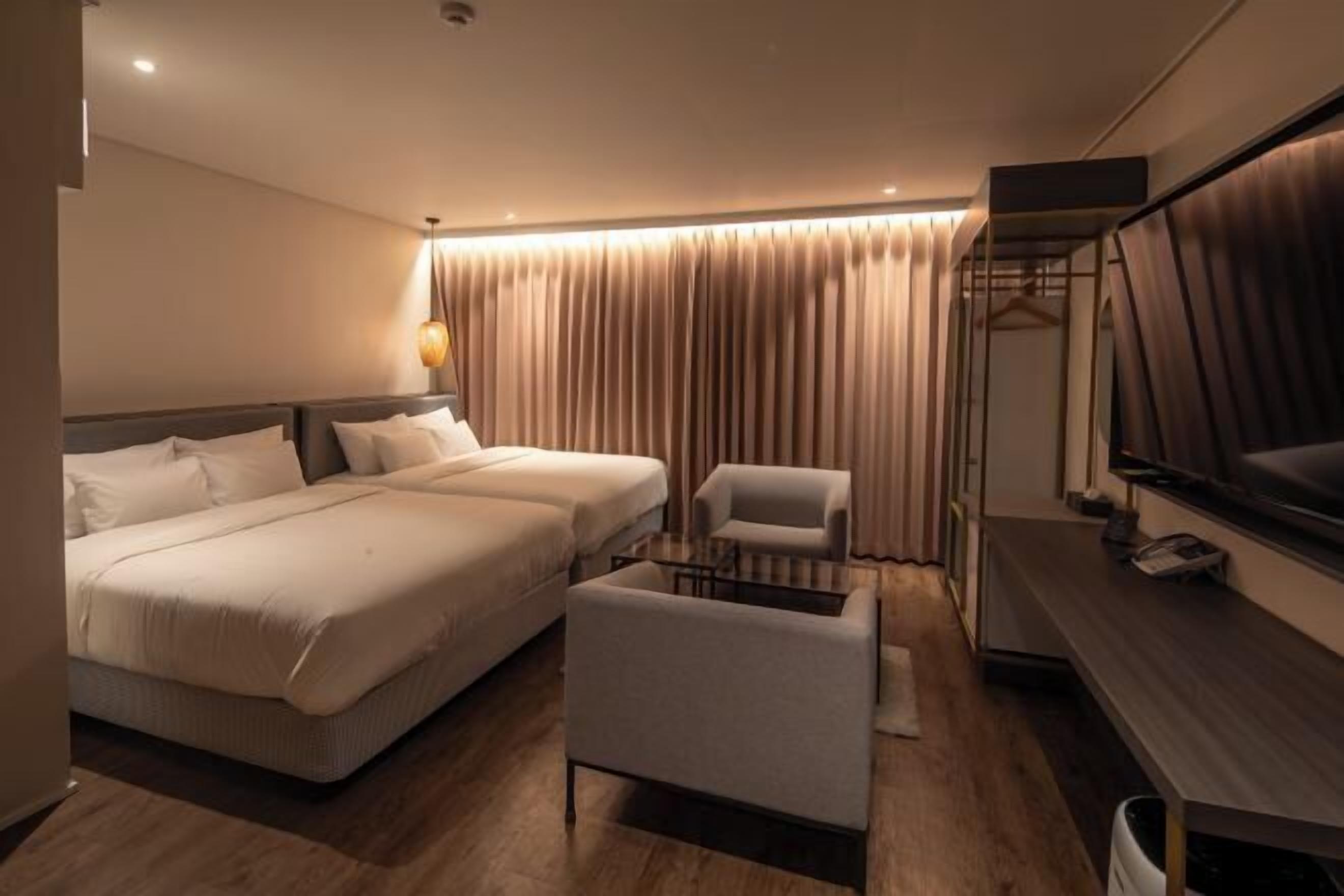 Couette en duvet d'oie, matelas Select Comfort, rideaux occultants