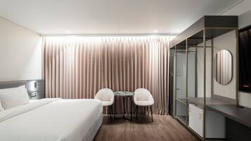 Chambre Deluxe avec lits jumeaux | Couette en duvet, lit avec matelas Select Comfort