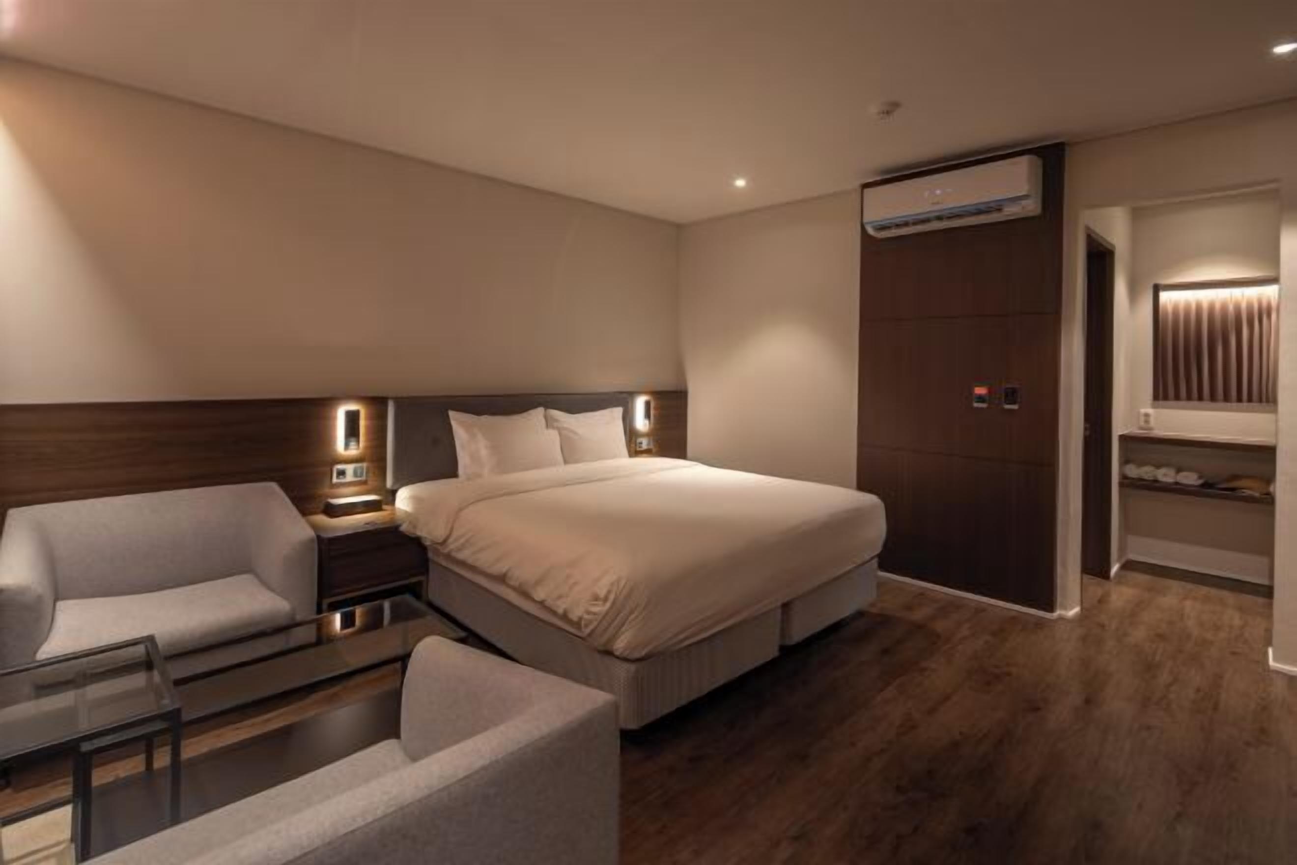 Down duvets, Select Comfort beds, blackout curtains, free WiFi