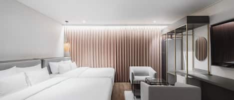 Superior Family Room | Dundyner, senger med Select Comfort-madrass og blendingsgardiner