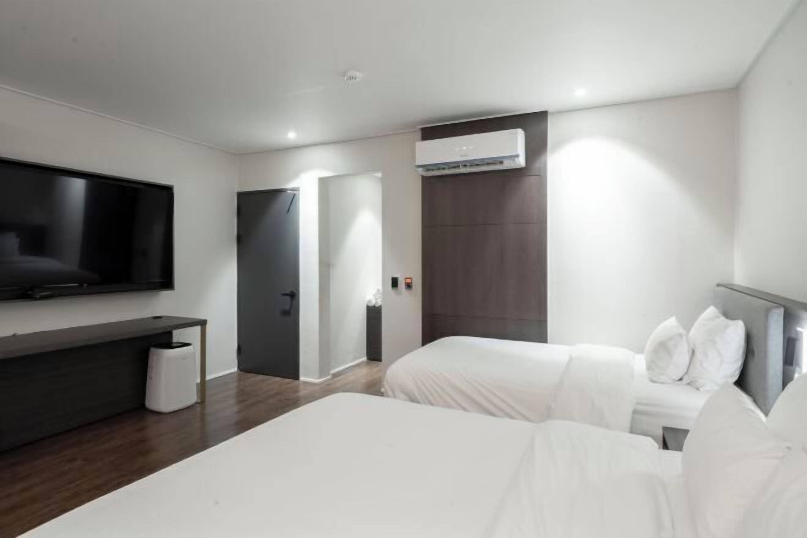 Couette en duvet d'oie, matelas Select Comfort, rideaux occultants