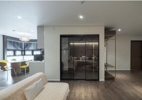 Presidential Suite | Living area | 65-inch flat-screen TV with cable channels