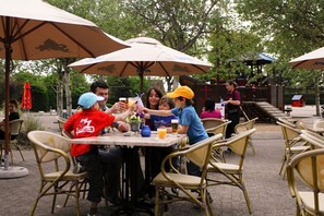 Enjoy casual dining under the shade of our outdoor umbrellas.