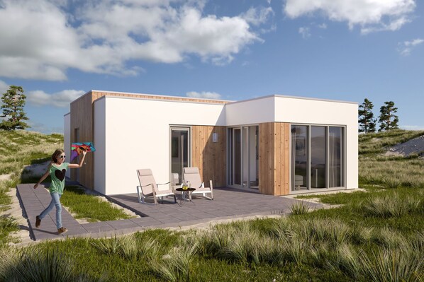 Relax in a serene setting with a patio area and outdoor seating for socializing or unwinding.