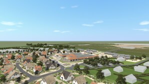 Luchtbeeld van een woongebied met huizen, wegen en groene velden.