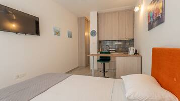 1 chambre, fer et planche Ă repasser, Wi-Fi gratuit, draps fournis