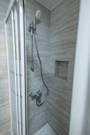 Hair dryer, towels, soap, shampoo