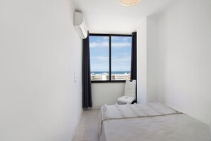 2 quartos, ferros/tábuas de passar roupa, Wi-Fi de cortesia