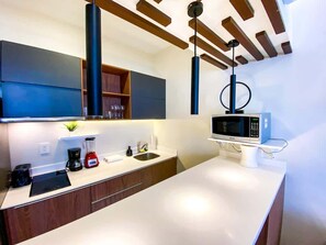 Fridge, microwave, stovetop, coffee/tea maker