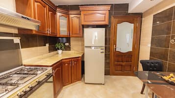 Apartment | Private kitchenette | Full-sized fridge, microwave, oven, stovetop