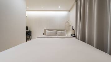 Basic Double Room | Premium bedding, memory foam beds, desk, soundproofing