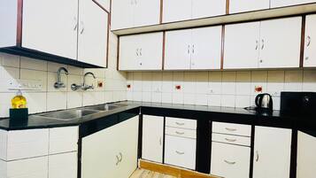 Fridge, microwave, stovetop, cookware/dishes/utensils