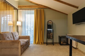 Apartment, 1 Schlafzimmer | Minibar, Zimmersafe, kostenloses WLAN, Bettwäsche