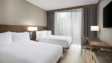 Room, 2 Queen Beds | In-room safe, desk, laptop workspace, blackout drapes