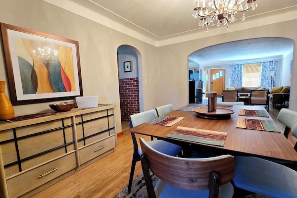Dine 6, exit thru enclosed porch to back yard, plus 2 and high chair in kitchen.