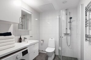 Shower, hair dryer, towels, soap