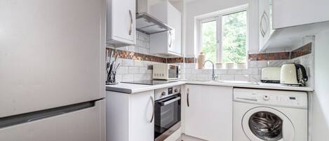 Frigorífic, forn, placa de cuina i torradora