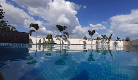 Outdoor pool. Econest Hotel