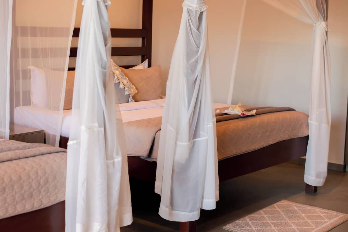 Family Quadruple Room | 1 bedroom, minibar, in-room safe, individually decorated