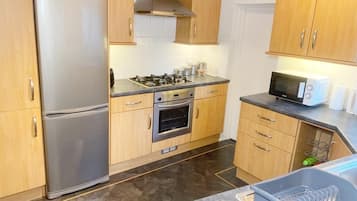 Fridge, microwave, oven, cookware/dishes/utensils