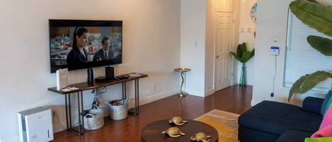 Condo, Multiple Beds, Balcony, Pool View | Living area | 40-inch TV with digital channels