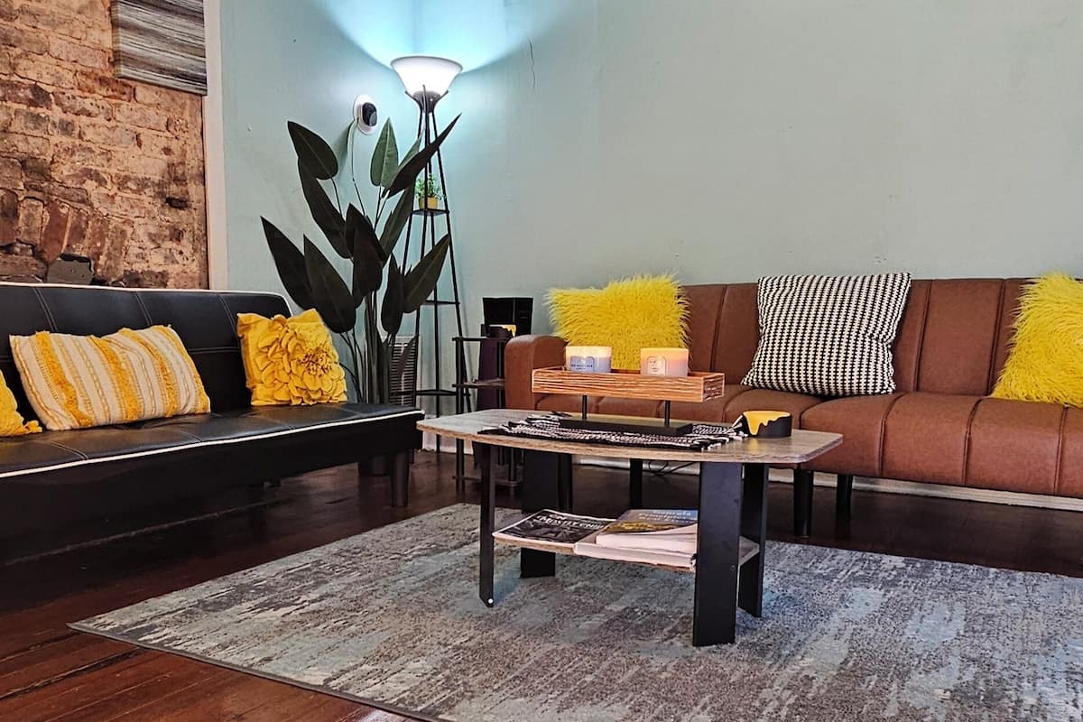 Apartment A | Living area | 65-inch Smart TV with digital channels, Netflix, Hulu