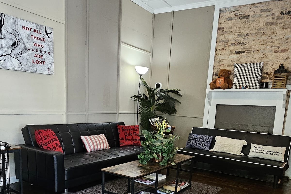 Apartment B | Living area | 65-inch Smart TV with digital channels, Netflix, Hulu