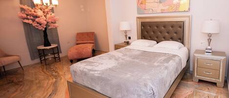 Down comforters, memory foam beds, in-room safe, laptop workspace