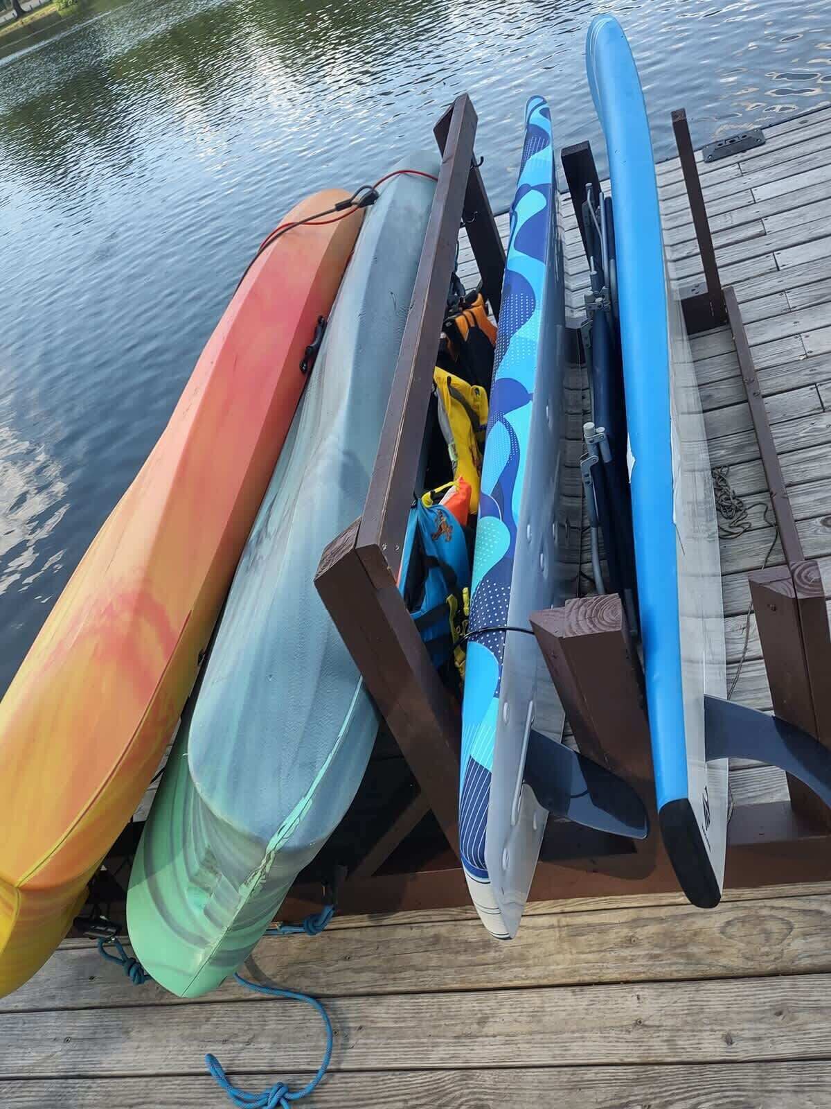 Kayaks and paddle boards are available for rent.