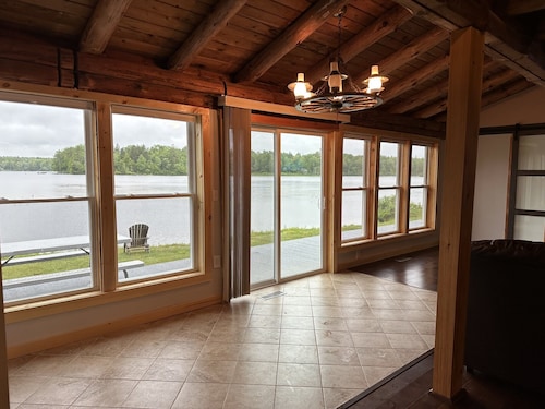 Beautiful private beach area within steps from the modern updated log home