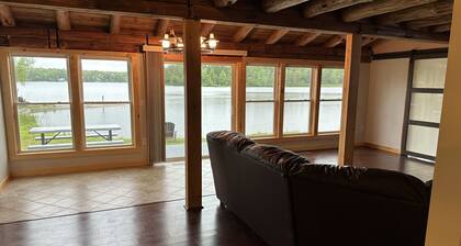 Beautiful private beach area within steps from the modern updated log home