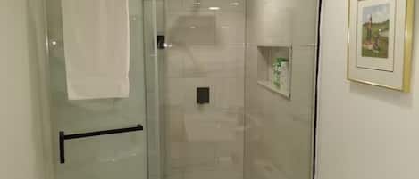 Shower, hair dryer, towels, soap