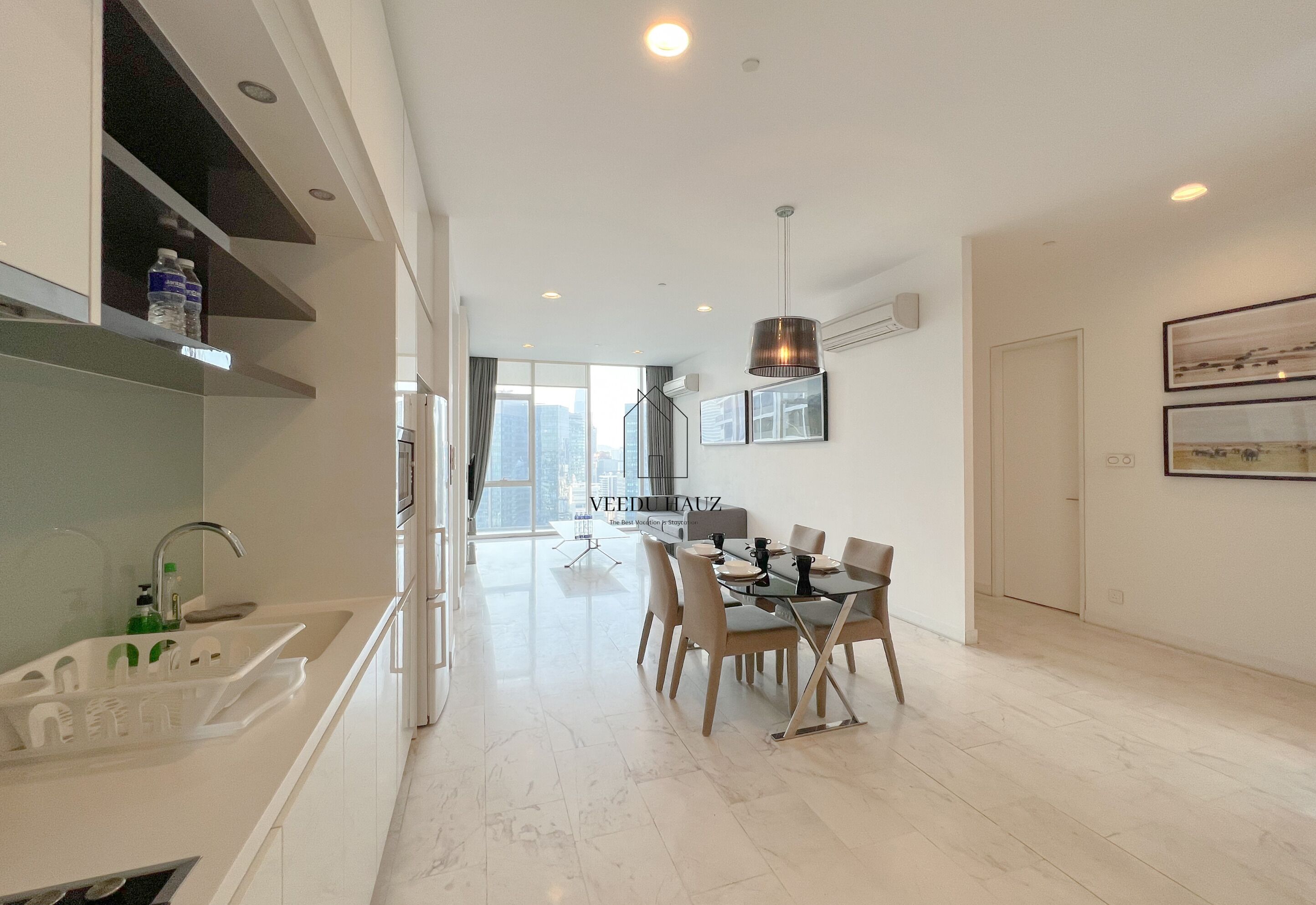 Executive Three Bedroom Apartment | Living area | 32-inch flat-screen TV with cable channels, TV, Netflix