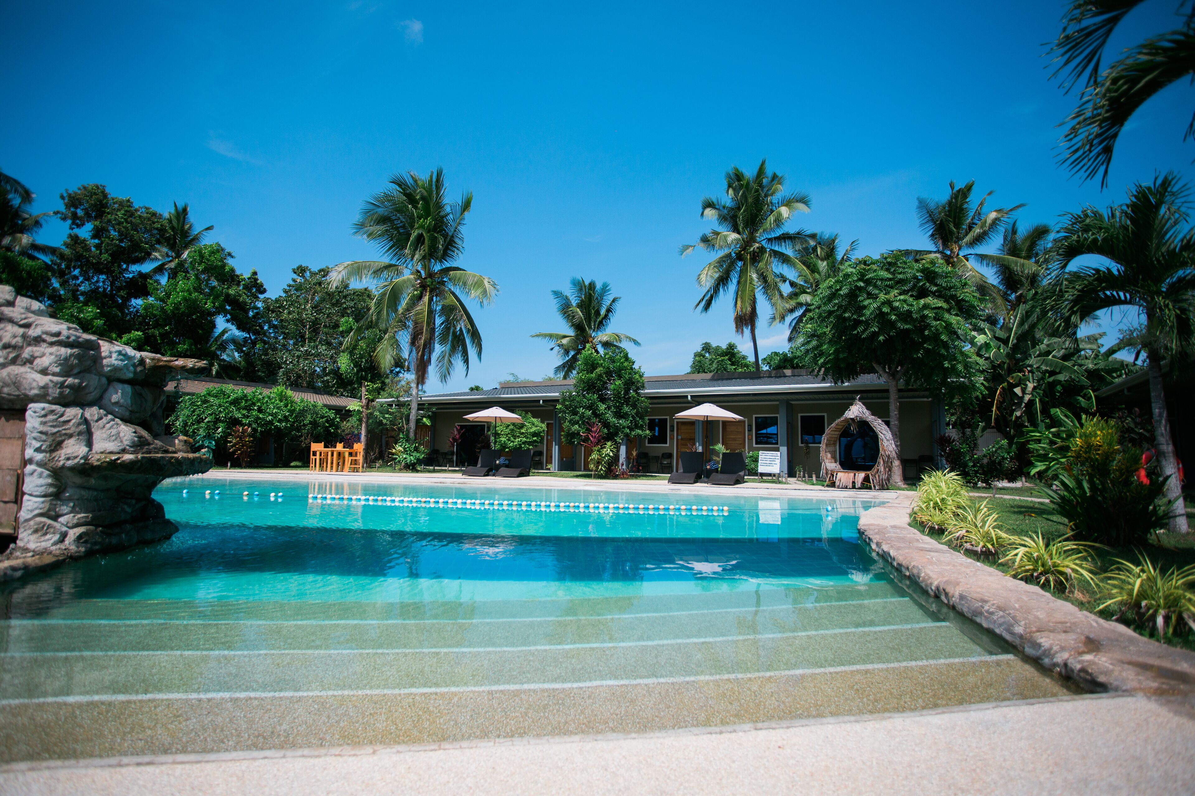 Outdoor pool, open 8:00 AM to 9:00 PM, pool umbrellas, pool loungers