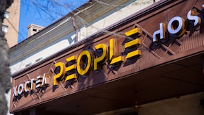 A building with a sign that reads "XOCEAL PEOPLE". - People Hostel (Bishkek)