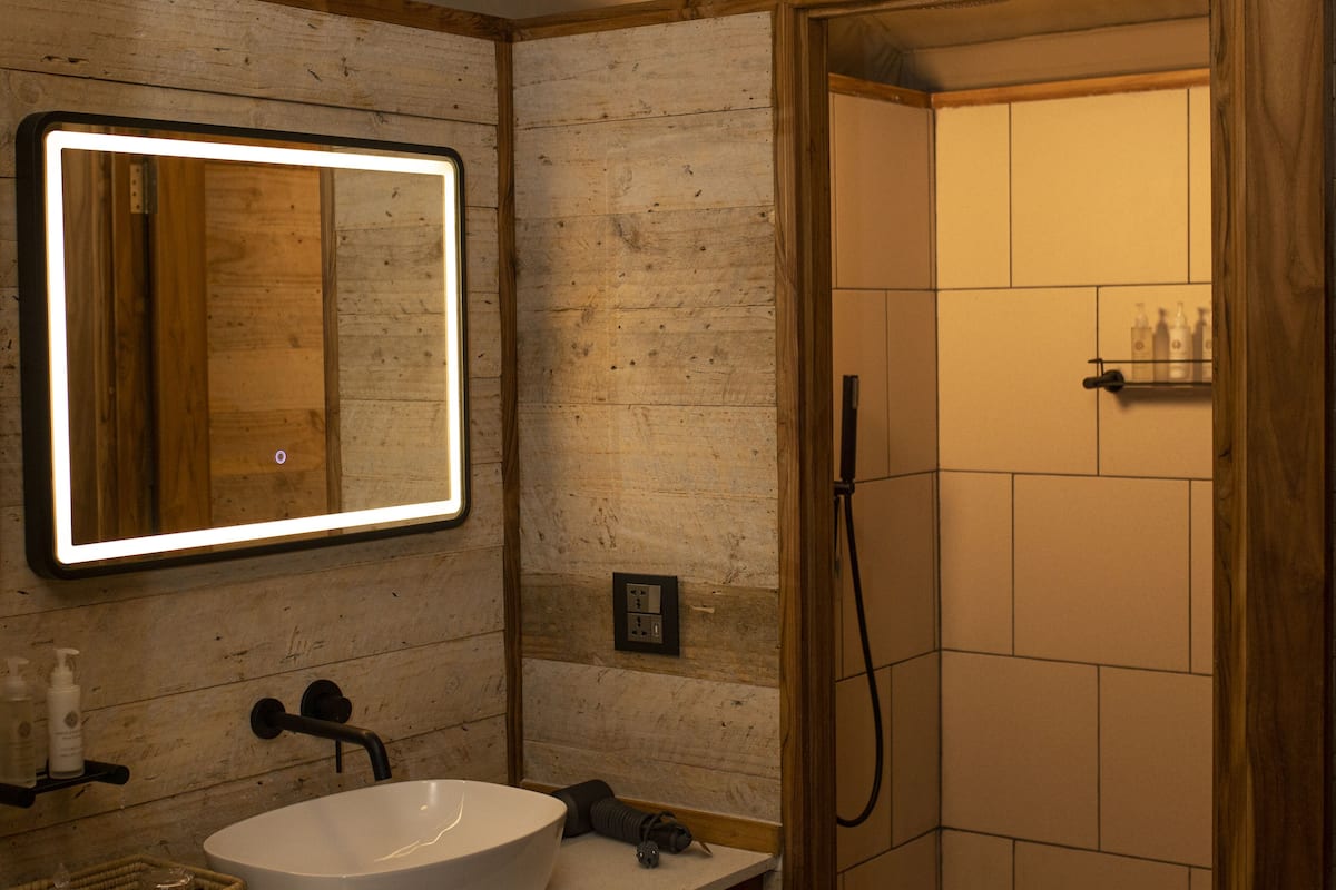Exclusive Tent | Bathroom | Shower, hair dryer, bathrobes, slippers
