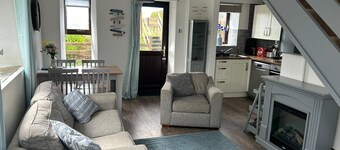 Cosy cottage in a quiet location overlooking the golf course to the sea