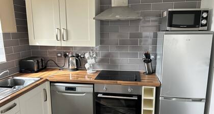 Cosy cottage in a quiet location overlooking the golf course to the sea
