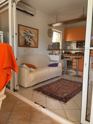 Departamento exclusivo | Área de sala de estar | Televisión de pantalla plana 