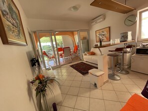 Departamento exclusivo | Área de sala de estar | Televisión de pantalla plana 