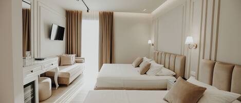 Deluxe Triple Room, 1 Bedroom, Non Smoking, Sea View | Egyptian cotton sheets, premium bedding, down comforters