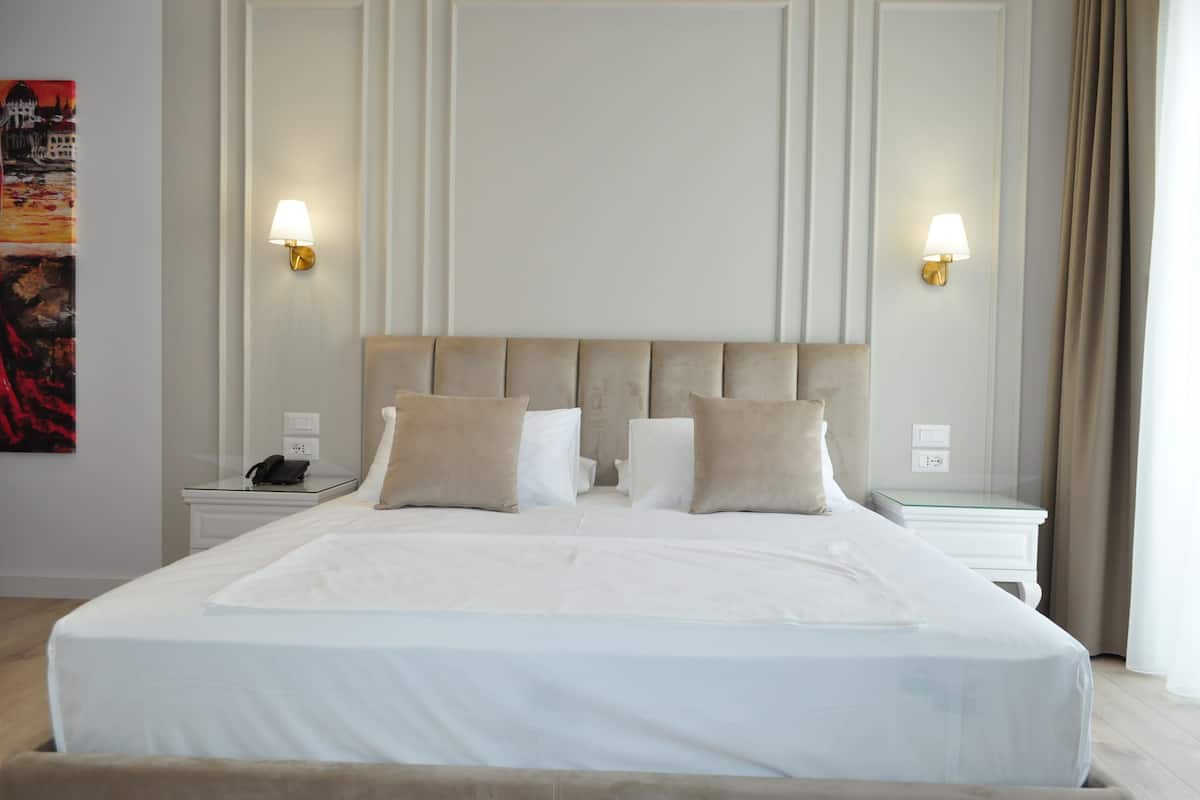 Egyptian cotton sheets, premium bedding, down duvets, memory-foam beds