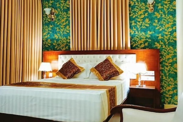 Deluxe-Doppelzimmer zur Einzelnutzung | Betten mit Memory-Foam-Matratzen, individuell dekoriert