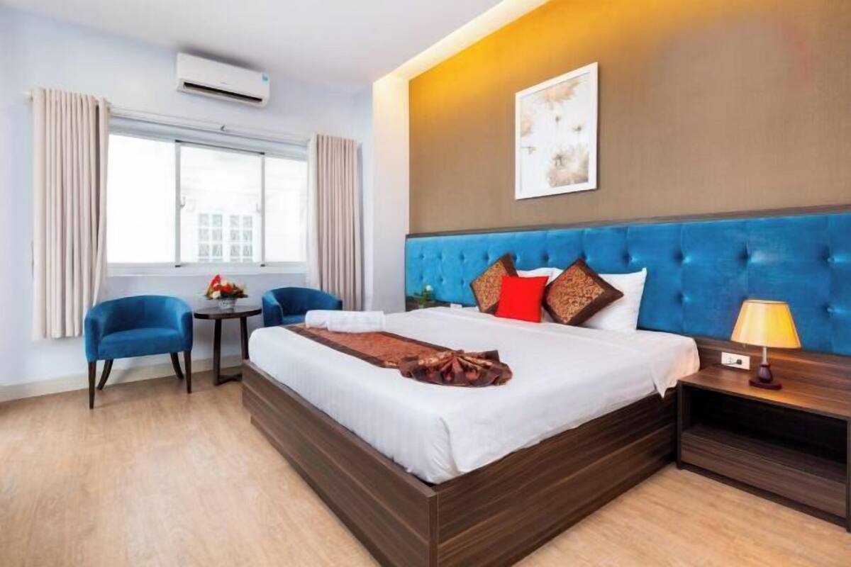 Luxe beddengoed, een minibar, een laptopwerkplek, gratis wifi