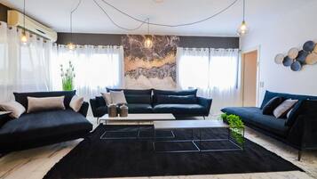 Villa | Living area | Flat-screen TV