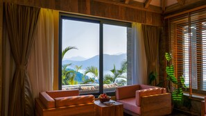 Dorjes Suite | Living area | 45-inch flat-screen TV with digital channels, TV - Dorje's Resort & Spa (Pokhara)