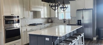 This beautiful spacious new home is perfect for group trips or family getaways.