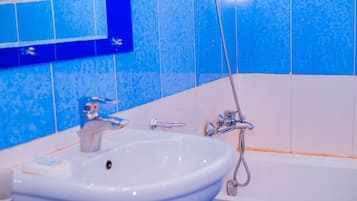 City Room | Bathroom | Spring water bathtub, hydromassage showerhead, free toiletries, slippers