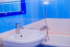 City Room | Bathroom | Spring water tub, hydromassage showerhead, free toiletries, slippers